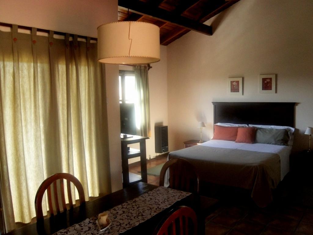 Las Ardillas Cabañas y Suites La Falda Habitación foto